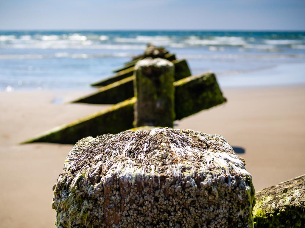 Landscape photograph — Wave breakers at Barmouth beach Wales