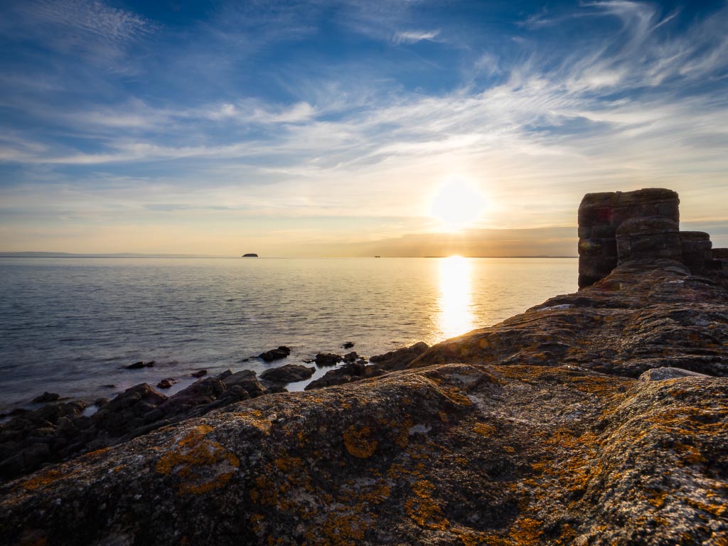 Landscape photograph — Wispy sky and sunset solitude at Weston-super-Mare