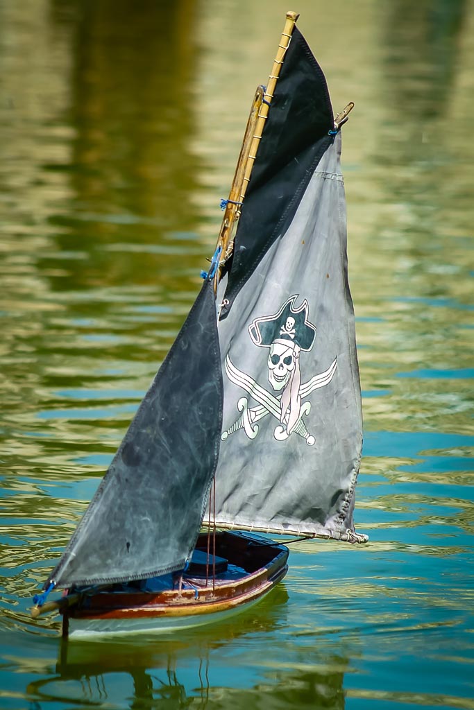 Travel photograph — Model boat on pond at luxembourg gardens Paris